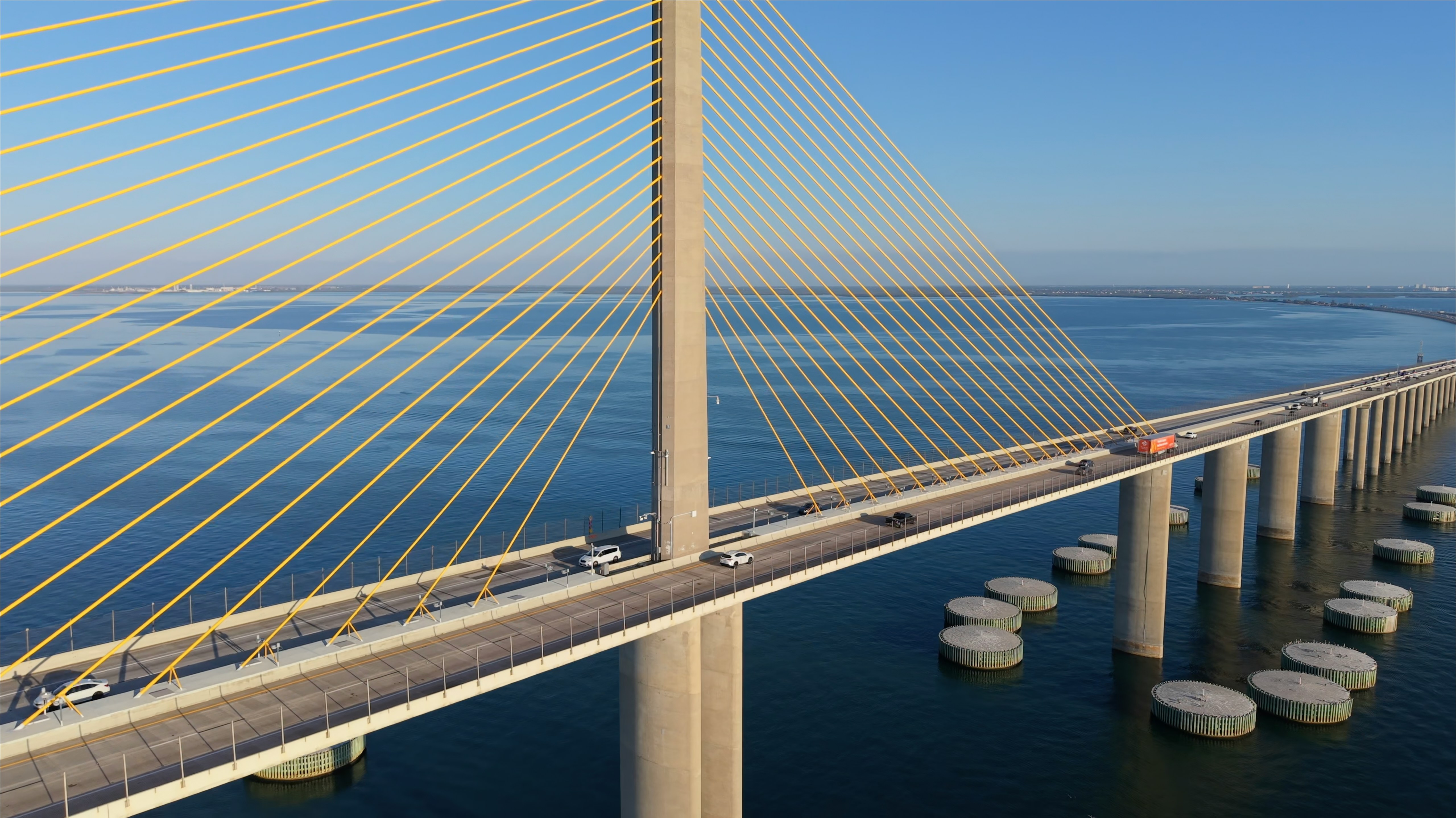 Tampa Bay waterfront with the Sunshine Skyway Bridge in the distance